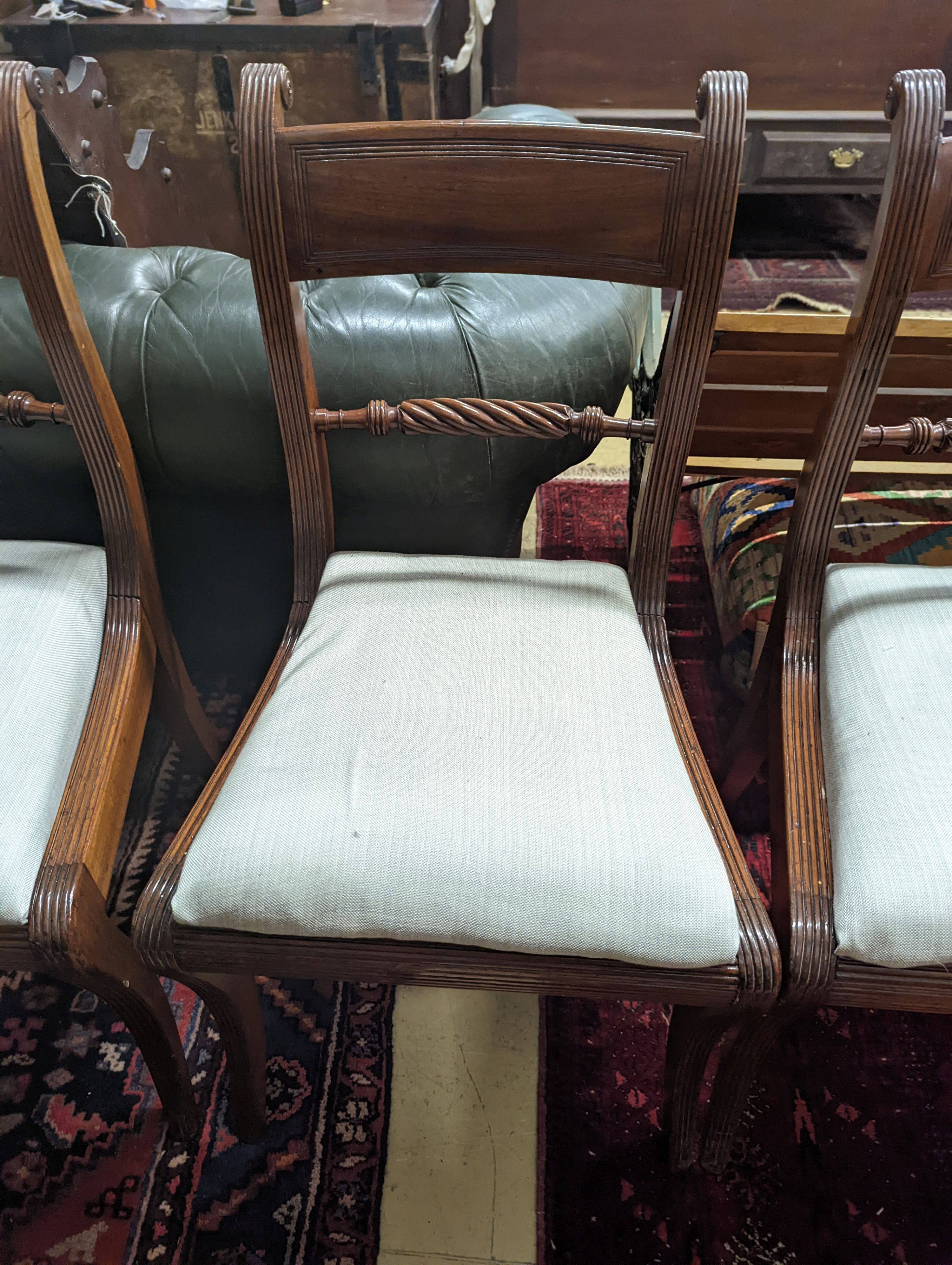 A set of six Regency mahogany dining chairs with rope twist backs